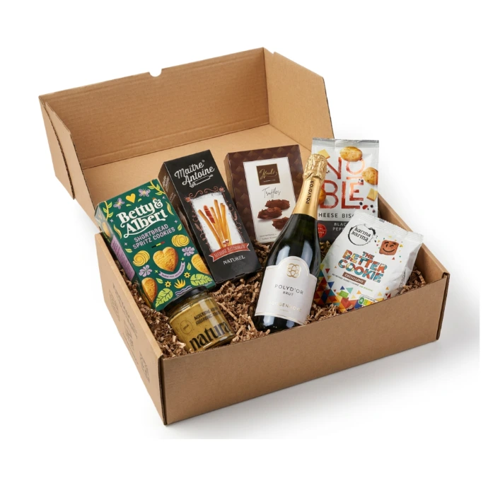 Een open Gourmetbox met haar ambachtelijke producten.